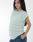 Blusa basica tela en textura rayas y transparencia verde