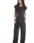 Set pantalon y blusa en tejido de punto tela transparencia negro